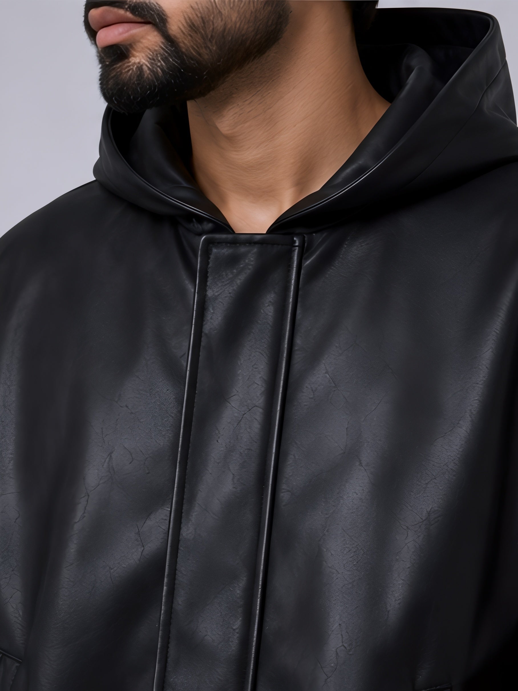 Black hooded faux leather jacket front view unisex streetwear