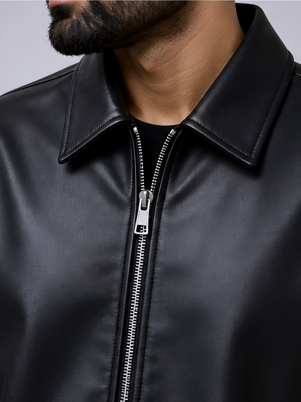 premium black leather jacket close up zipper detail