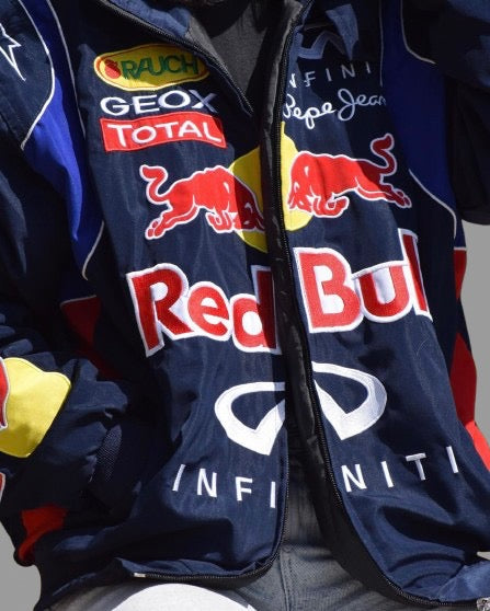 Close-up of DWNTWN's premium Red Bull Racing Jacket detailing.