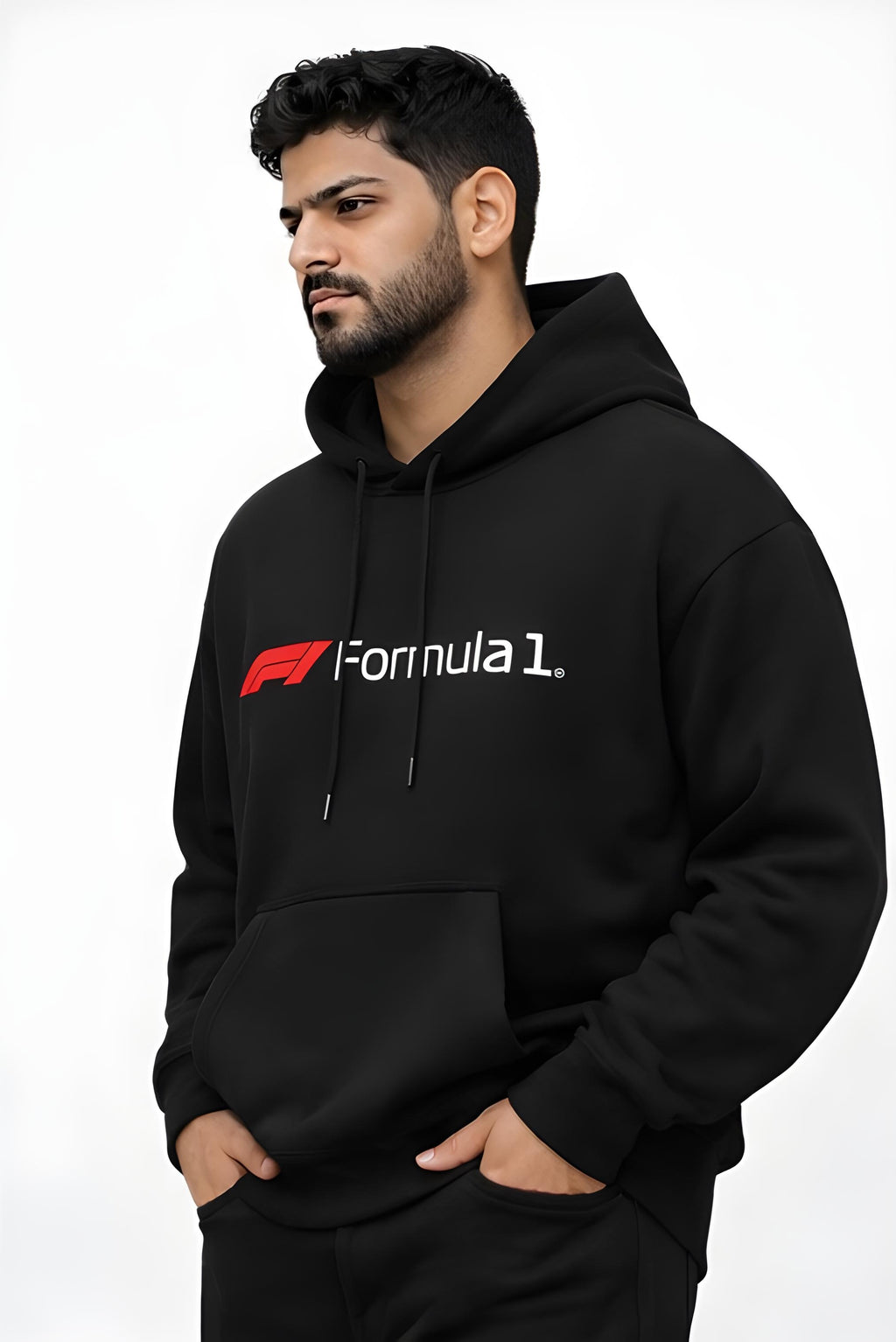 Man wearing a black Formula 1 hoodie on a white background side view